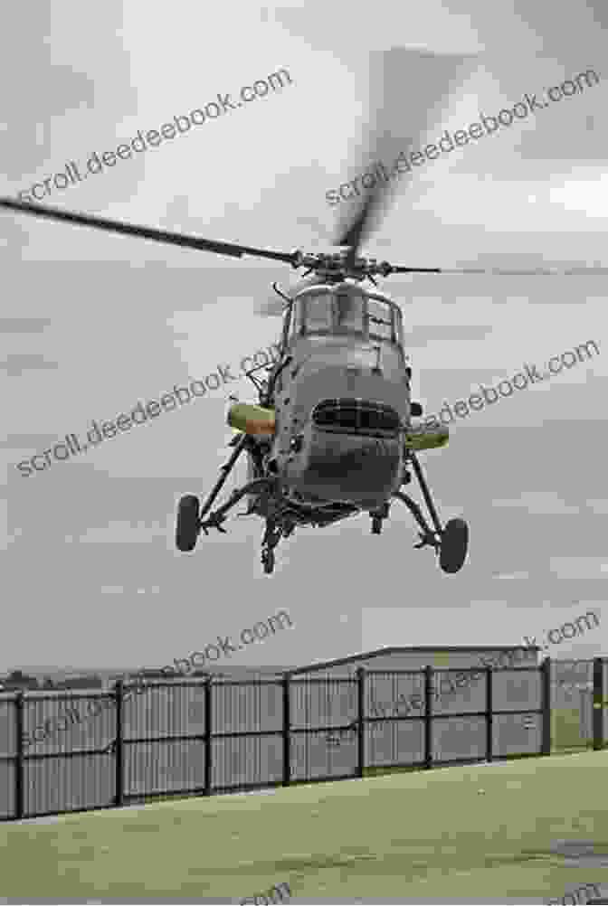 A British Army Helicopter Flies Over Belfast During The Air War Over Northern Ireland. Air War Northern Ireland: Britain S Air Arms And The Bandit Country Of South Armagh Operation Banner 1969 2007