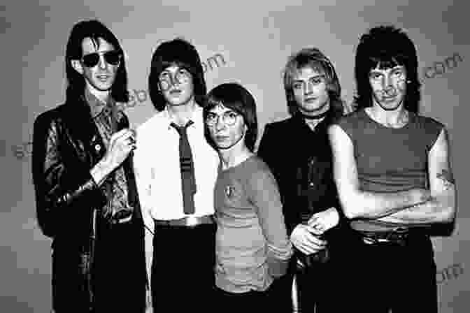 Members Of The Rock Band The Cars, Including Benjamin Orr, Ric Ocasek, Elliot Easton, David Robinson, And Greg Hawkes, Posing For A Group Photo. Let S Go : Benjamin Orr And The Cars