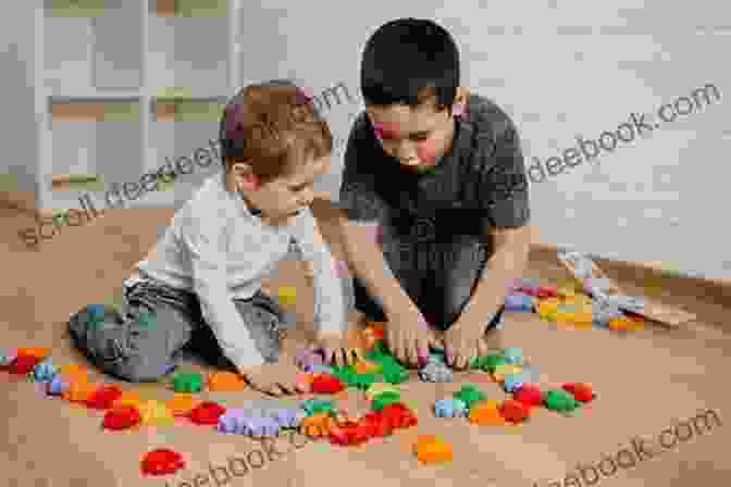 Rob Drummond Playing With Children In A Playful And Engaging Environment. Rob Drummond Plays With Participation: Bullet Catch Wallace The Majority Top Table Eulogy Rolls In Their Pockets